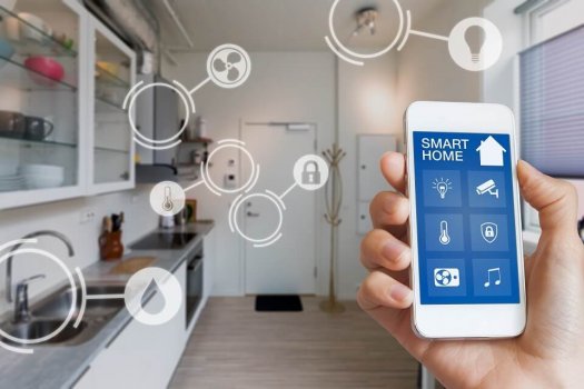 Smart home interface on smartphone app screen with augmented reality (AR) view of internet of things (IOT) connected objects in the appartment interior, person holding device